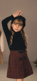 Mode Avant Turtleneck & Plaid Skirt